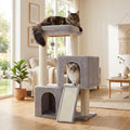 Two cats resting on a gray multi-level cat tree with a scratching ramp